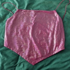 Pink, shiny top with open back